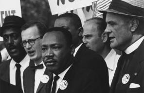 Black and white photo of MLK and Mathew Ahmann in a Crowd